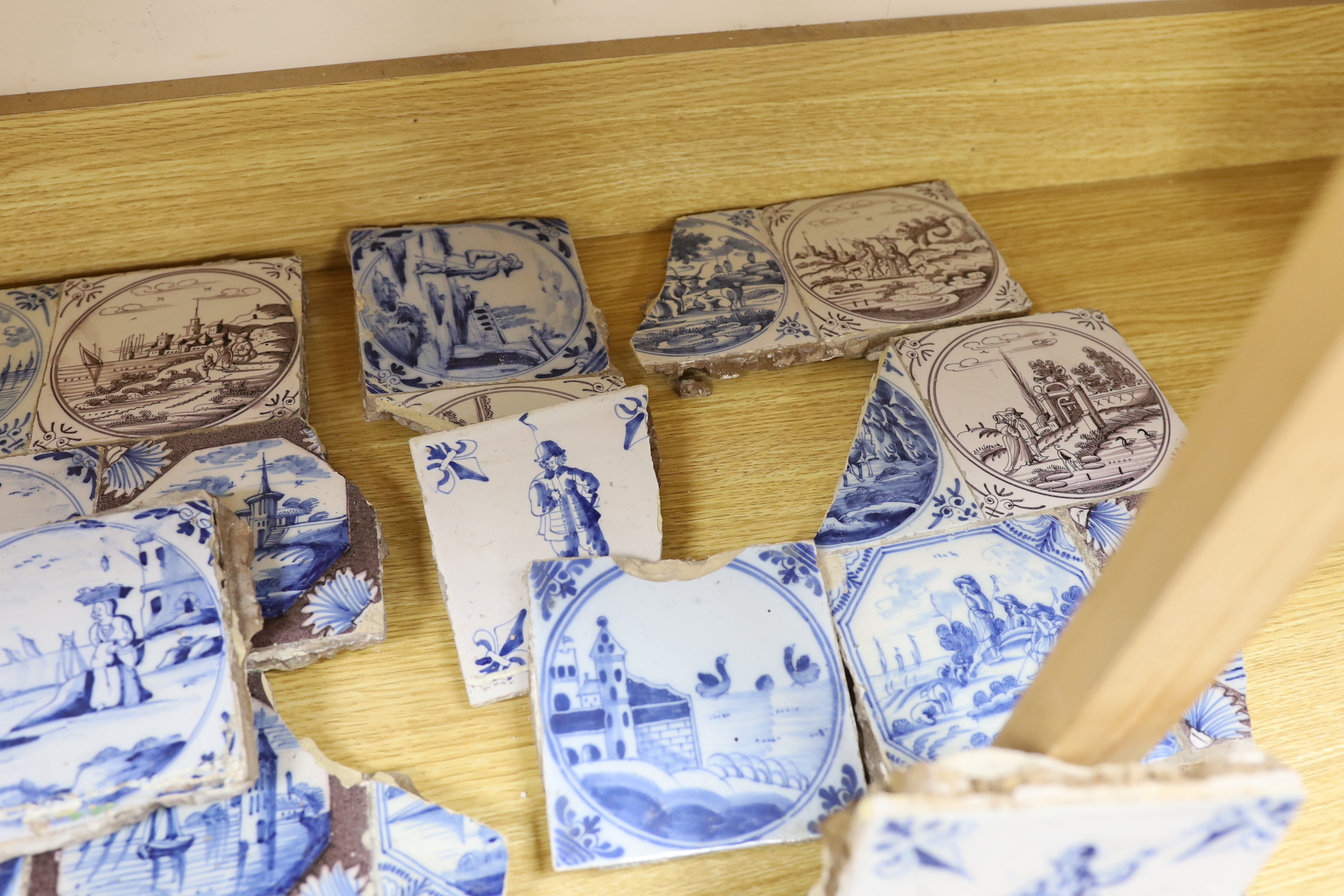A collection of 18th century Delft Blue and white or manganese tiles (a.f.)